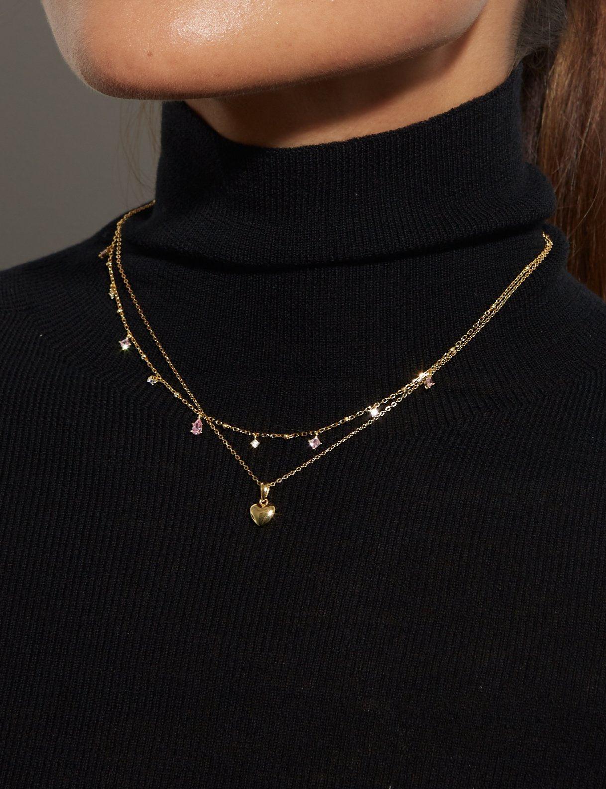 Collar de corazón dorado