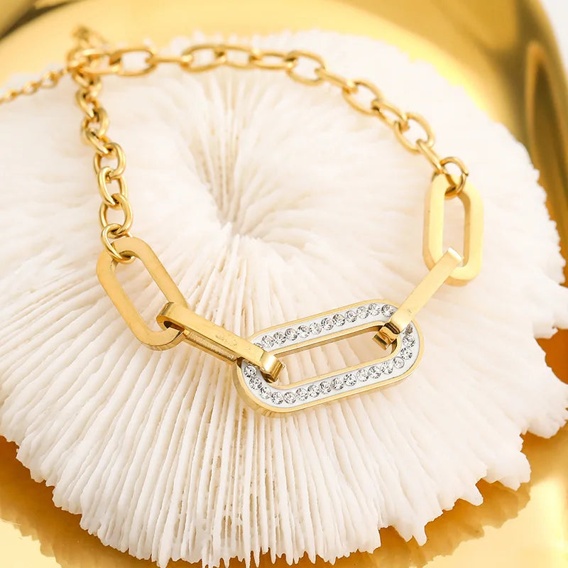 Elegante pulsera de acero inoxidable con dije de circonita para mujer