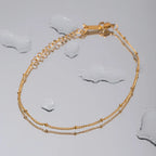 Tobillera con cuentas y cadena elegante