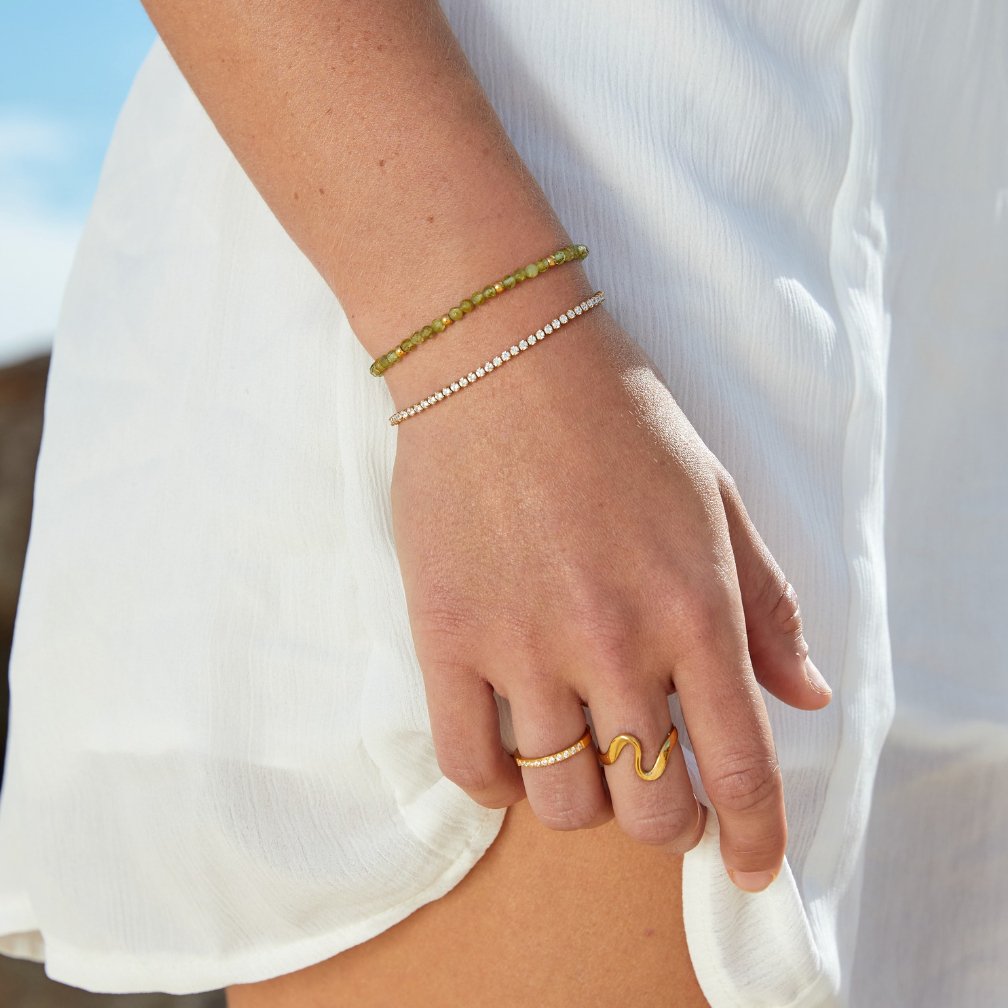 Pulsera de circonitas doradas