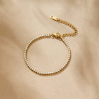 Pulsera de circonitas doradas