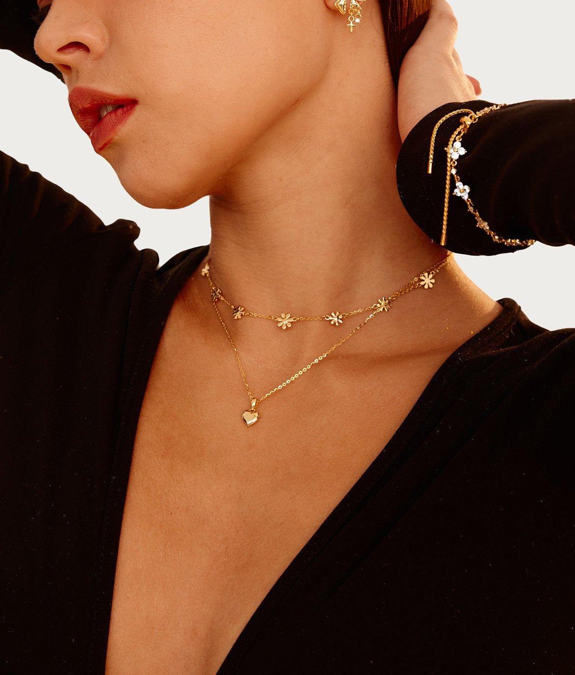 Collar de corazón dorado